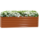 Long, rectangular, brown metal garden with white flowers.