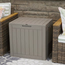 Closed gray, small storage box in between two patio chairs.